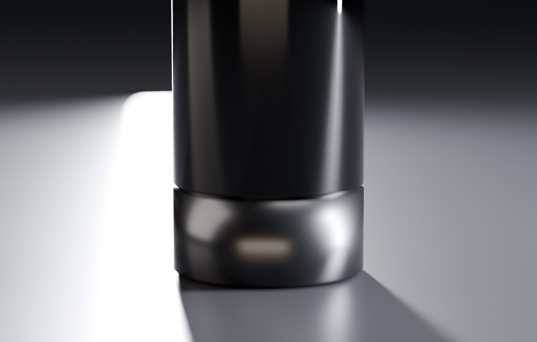 The cam-driven bottom cap — the only part the user turns