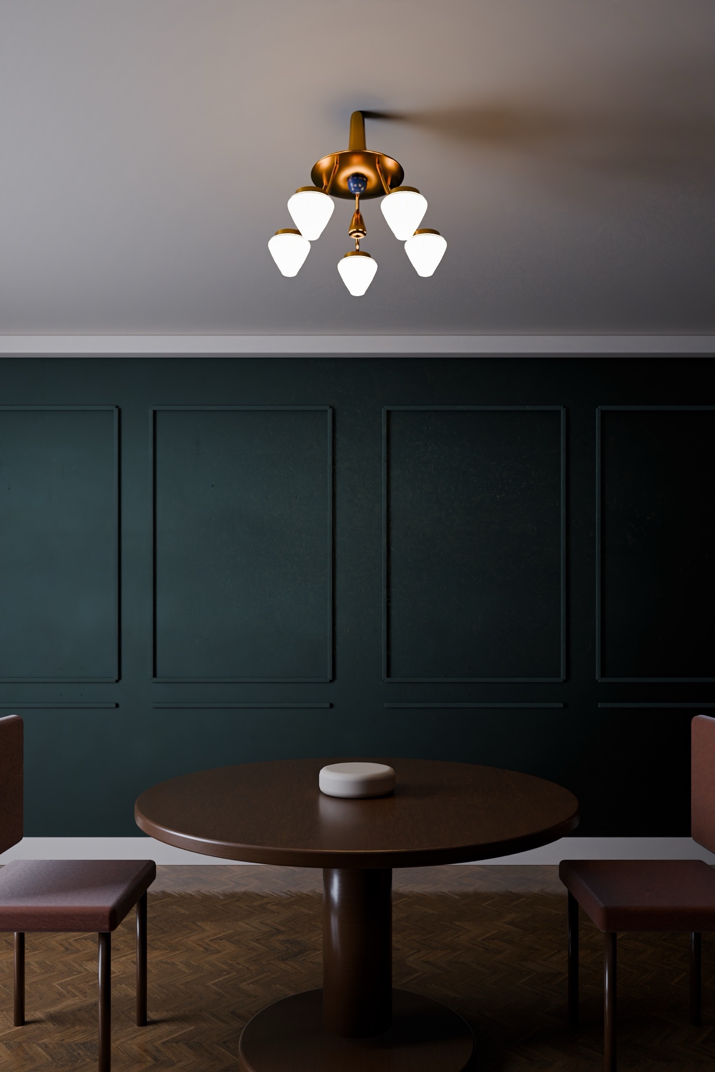 The chandelier over a round walnut table, in a staged dining room